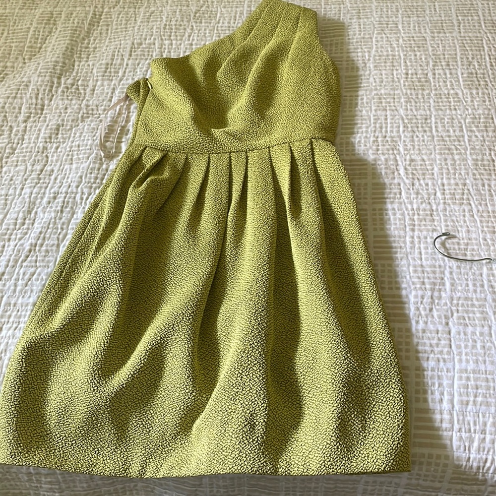 One shouldered cocktail dress.